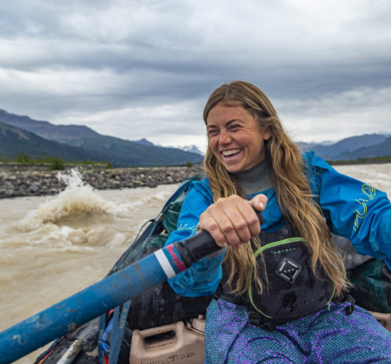 Happy guide rafting in Alaska - McCarthy River Tours
